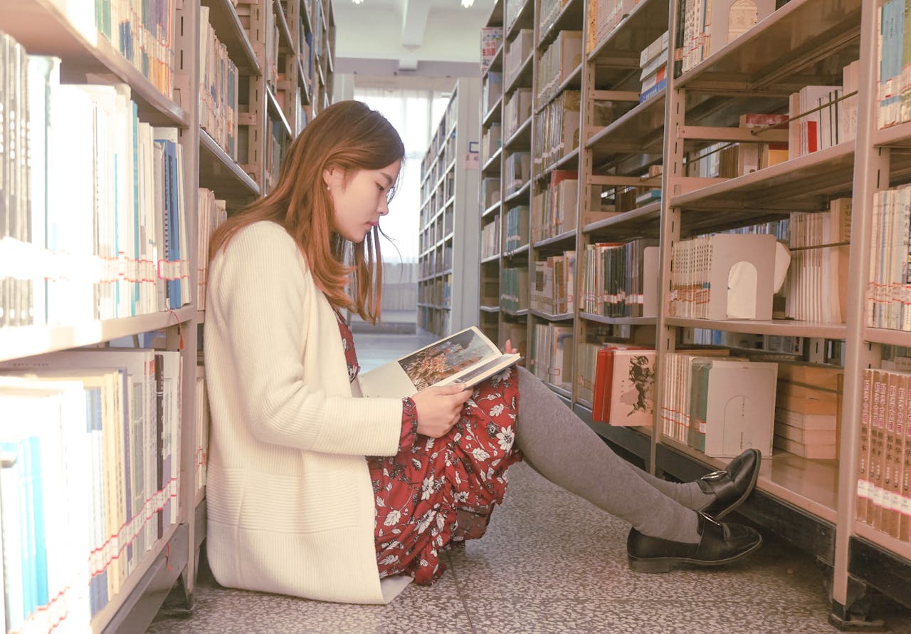 A woman studying in a library